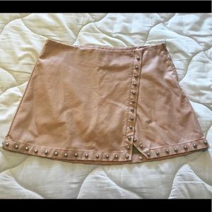 Faux leather skirt with metal studs